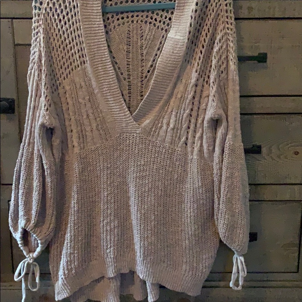 Taupe sweater with tie sleeves